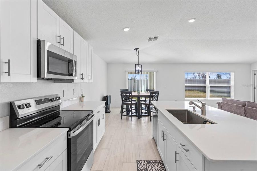 Furnished interior view inside a new home in North Park Isle: The Estates II, Plant City (Image 44). Furnished interior view inside a new home in North Park Isle: The Estates II, Plant City (Image 44).