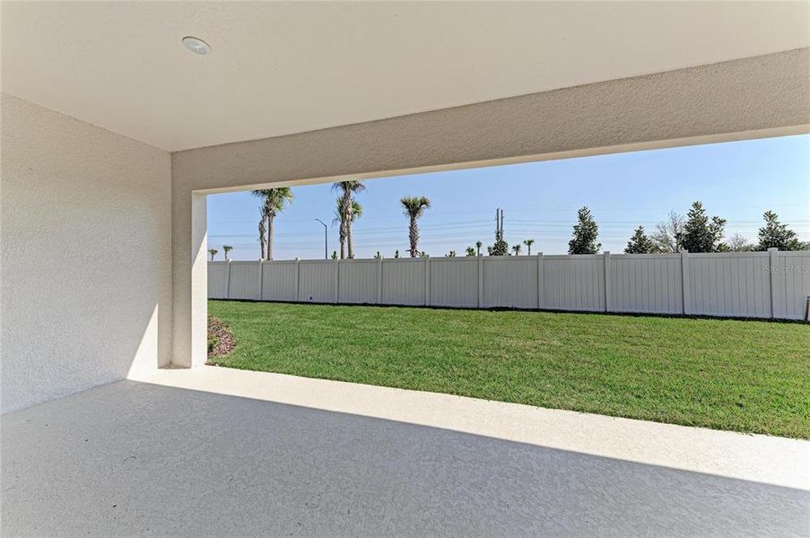 Exterior details and patio area of a home in Oakfield, Parrish (Image 2).