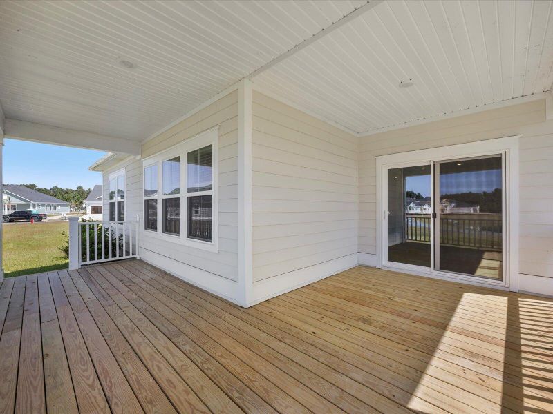 Exterior details and patio area of a home in The Coves at Lakes of Cane Bay, Summerville (Image 29). Exterior details and patio area of a home in The Coves at Lakes of Cane Bay, Summerville (Image 29).