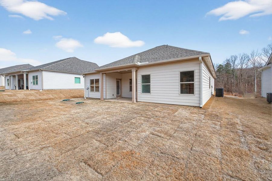 Exterior details and patio area of a home in , Homer (Image 4). Exterior details and patio area of a home in , Homer (Image 4).