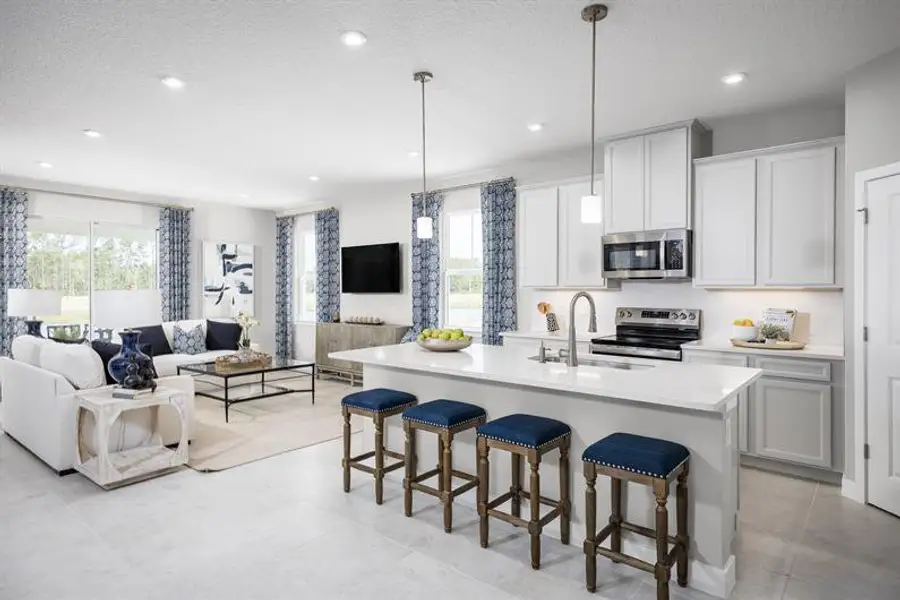 Representative furnished interior of a home built from the Kingsley by Ryan Homes in Parkview Preserve, Apopka (Image 7).