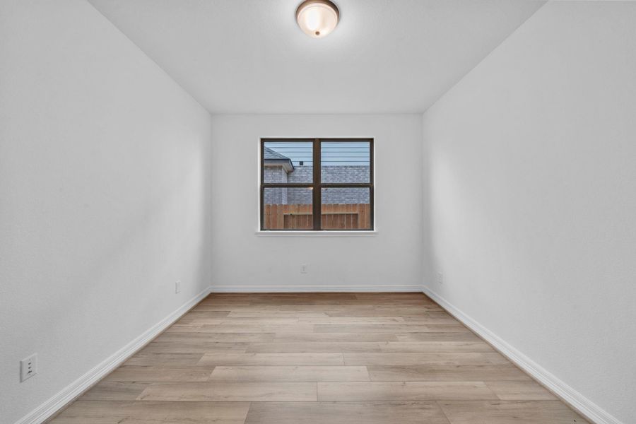 A flexible space ready to adapt—perfect for a playroom, hobby space, or cozy retreat.