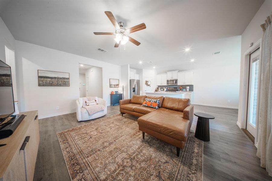 Open concept kitchen, living room & dining area Open concept kitchen, living room & dining area