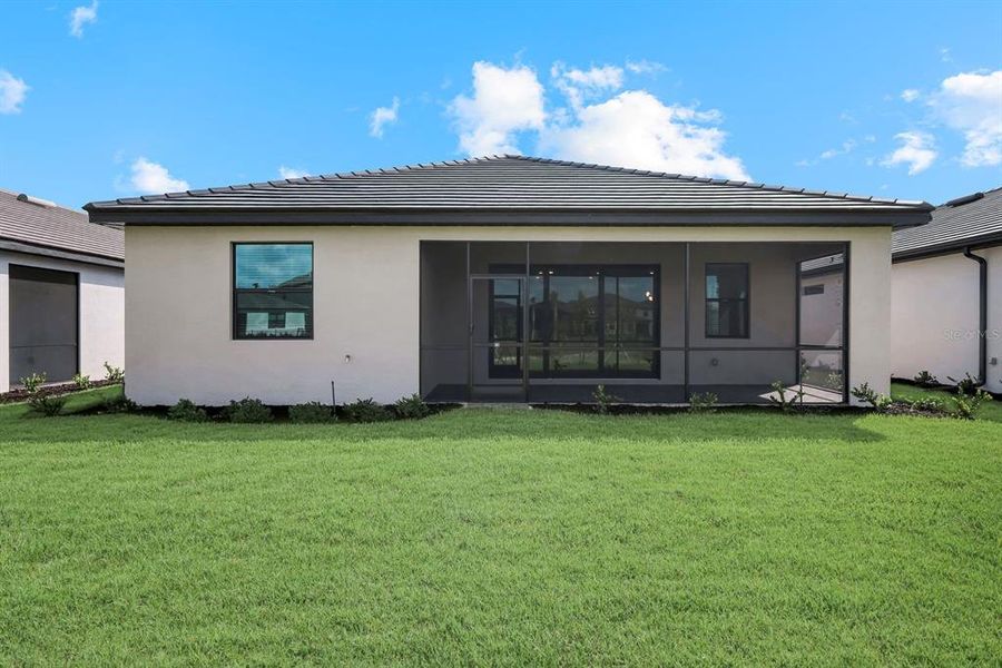 Exterior details and patio area of a home in Verdana Village, Estero (Image 4).