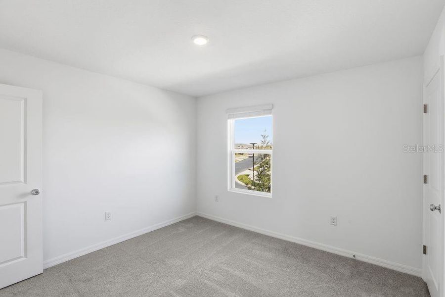 Spacious, unfurnished interior of a new home in Waterstone, Groveland (Image 31).