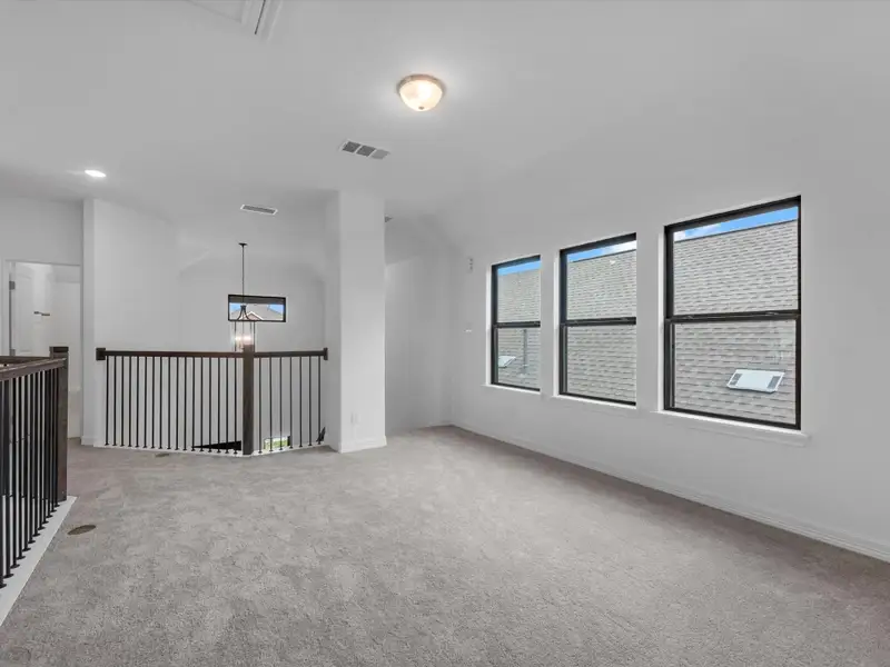 Upstairs loft. Sample product photo. Actual exterior and interior selections may vary by homesite. Photo may be virtually staged.
