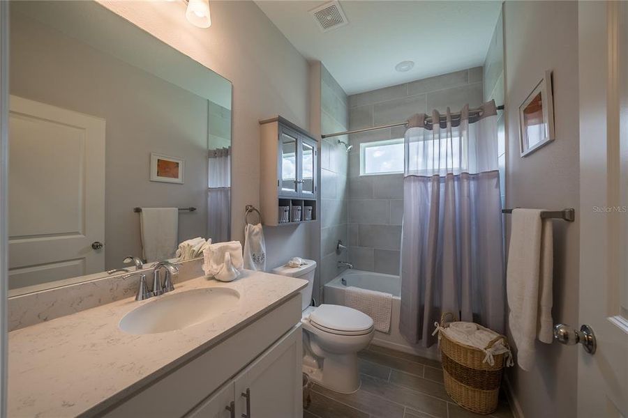 Furnished interior view inside a new home in Grand Park North, Dunnellon (Image 18).