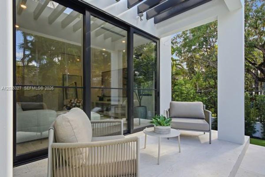 Exterior details and patio area of a home in , Coral Gables (Image 4).