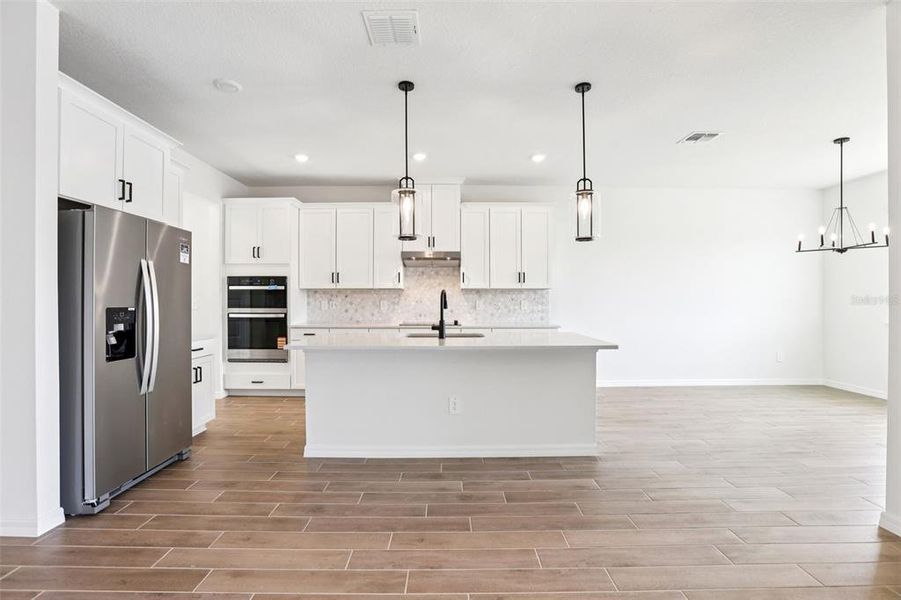 Furnished interior view inside a new home in Two Rivers - Signature Series, Zephyrhills (Image 17). Furnished interior view inside a new home in Two Rivers - Signature Series, Zephyrhills (Image 17).