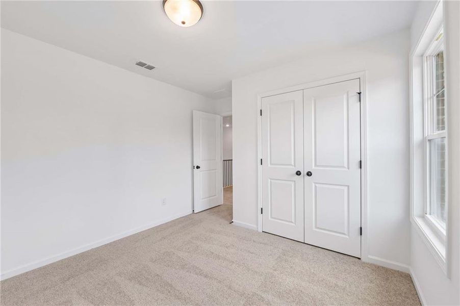 Spacious, unfurnished interior of a new home in Eastlyn Crossing, Flowery Branch (Image 21). Spacious, unfurnished interior of a new home in Eastlyn Crossing, Flowery Branch (Image 21).