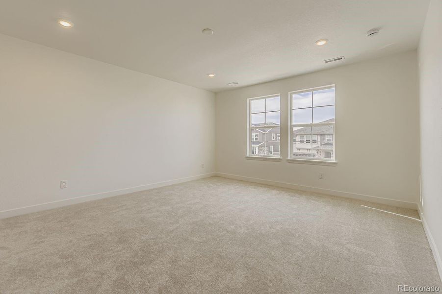 Spacious, unfurnished interior of a new home in Newlin Crossing: The Monarch Collection, Parker (Image 13).