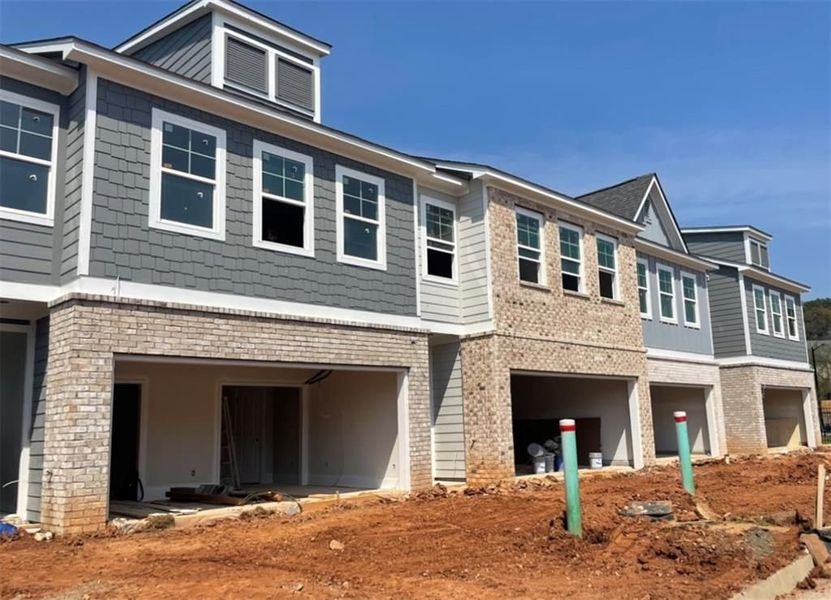 Front exterior of a new home in Rosehill Townhomes, Marietta, GA, highlighting curb appeal (Image 6).