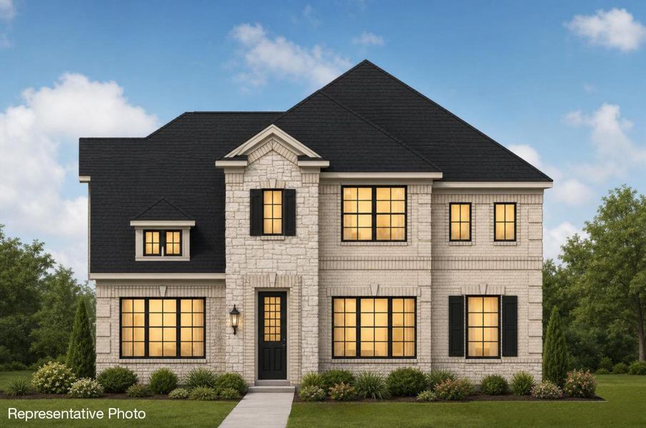 Representative exterior photo of a completed home built from the Royal Savannah by Grand Homes in Edgewater, Fate, TX (Image 17).