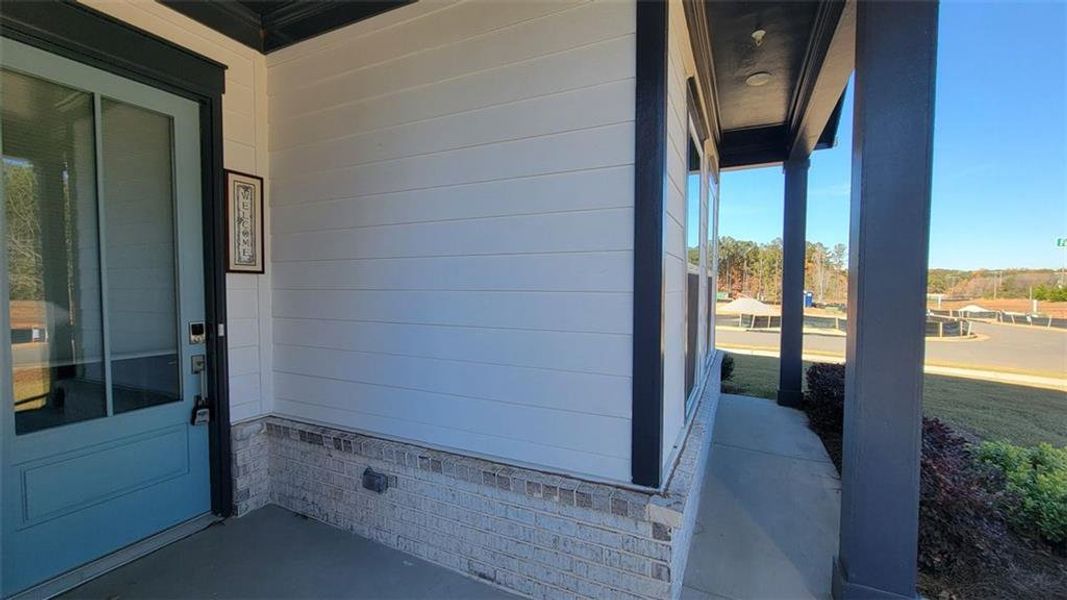 Exterior details and patio area of a home in The Reserve at Bells Ferry, Kennesaw (Image 31).