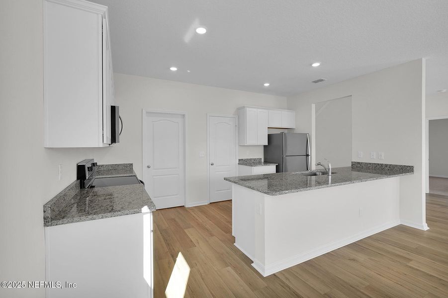 Furnished interior view inside a new home in Westport Landing, Jacksonville (Image 7).