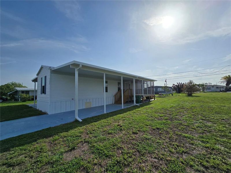 Exterior details and patio area of a home in , Englewood (Image 18).