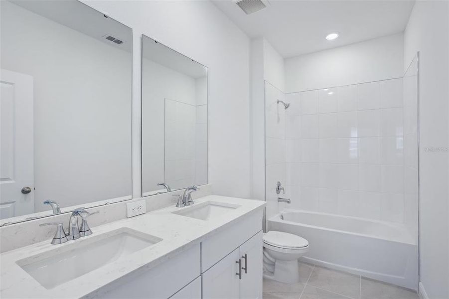 Furnished interior view inside a new home in Cyrene at Minneola - Villas, Montverde (Image 5). Furnished interior view inside a new home in Cyrene at Minneola - Villas, Montverde (Image 5).