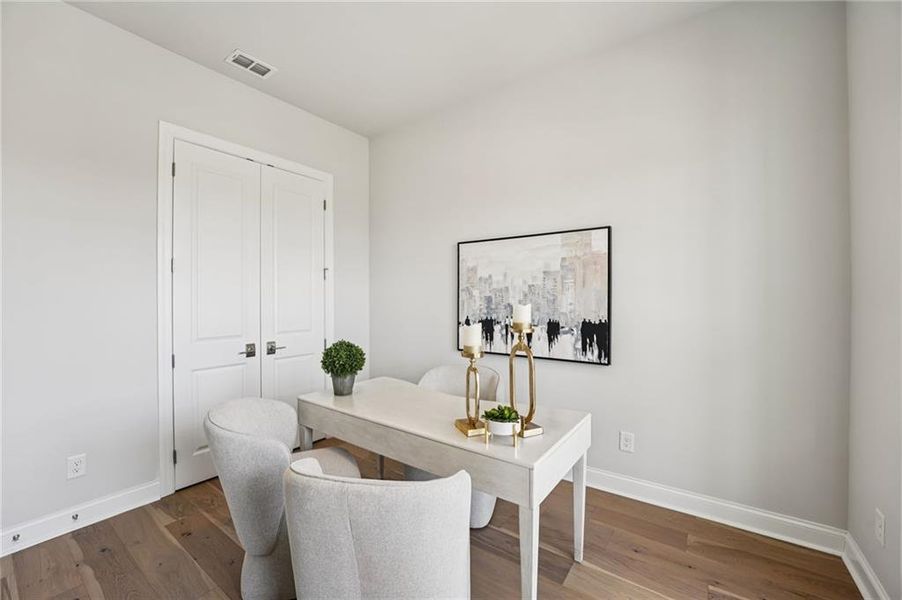 Furnished interior view inside a new home in Promenade at Sawnee Village, Cumming (Image 6).