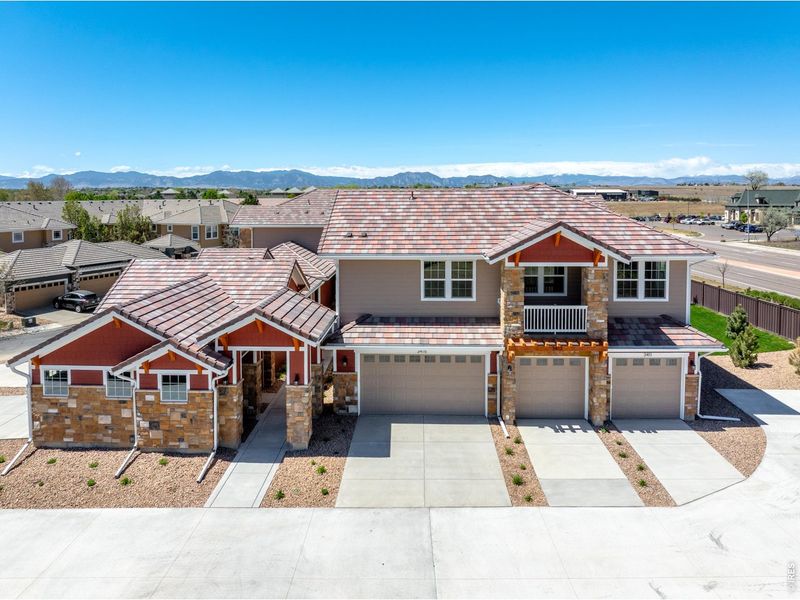 Front exterior of a new home in , Broomfield, CO, highlighting curb appeal (Image 22).