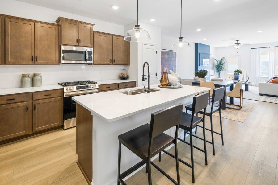 **These photos are examples of a different home with the same floorplan. Interior and exterior may differ.**