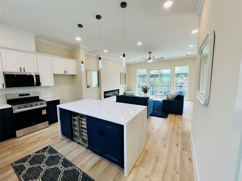 staged photos are from 3229. 3231 is not staged and is ready to move in.