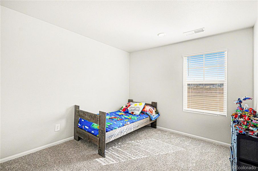 Furnished interior view inside a new home in Murphy Creek, Aurora (Image 34).