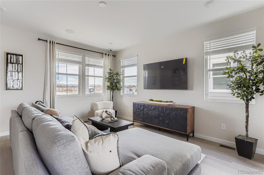 Furnished interior view inside a new home in Barefoot, Firestone (Image 15).