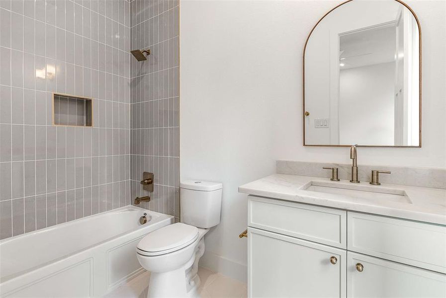 Full bathroom with  shower combination, vanity, and light tile patterned floors