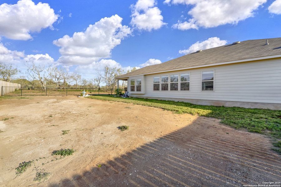 Front exterior of a new home in Chaparral Ranch, Floresville, TX, highlighting curb appeal (Image 28).