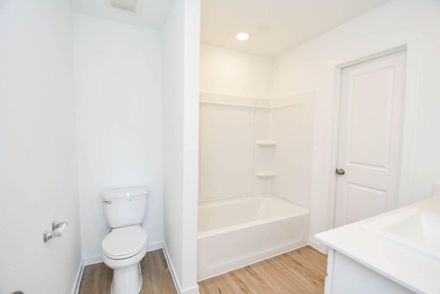 Furnished interior view inside a new home in Ladera Trails, Conroe (Image 11).