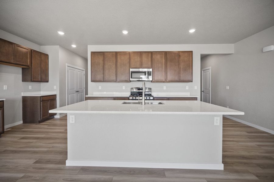 Representative furnished interior of a home built from the Lilac by View Homes in Aspen Ranch, Fountain (Image 5).