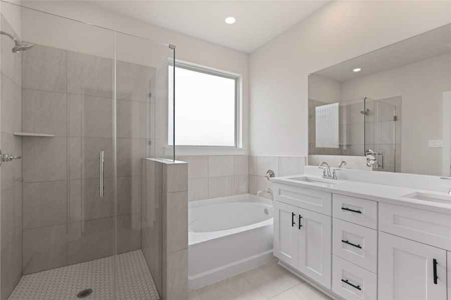 Primary Bathroom, Tub and shower combo.