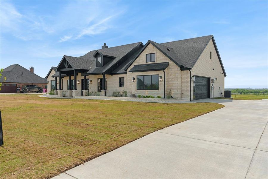 Front exterior of a new home in , Sherman, TX, highlighting curb appeal (Image 22). Front exterior of a new home in , Sherman, TX, highlighting curb appeal (Image 22).