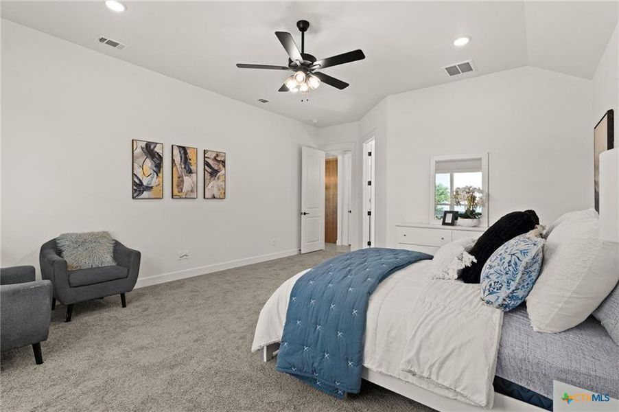 Bedroom featuring carpet, recessed lighting, ceiling fan, and lofted ceiling