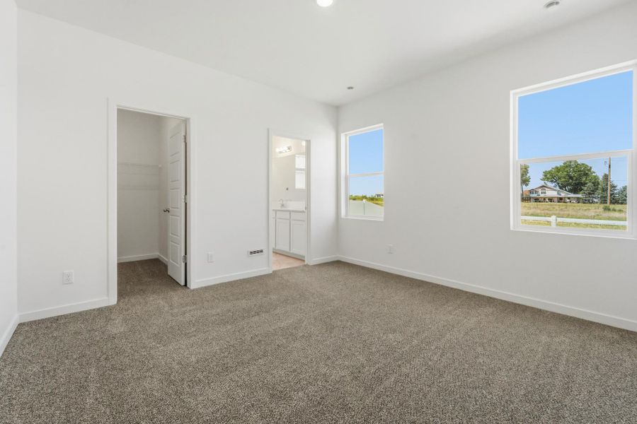 Spacious, unfurnished interior of a new home in Union Colony West, Greeley (Image 23).