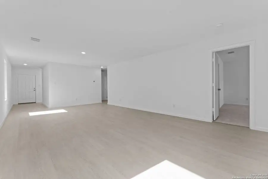 Spacious, unfurnished interior of a new home in Randolph Crossing: Cottage Collection, Converse (Image 9).