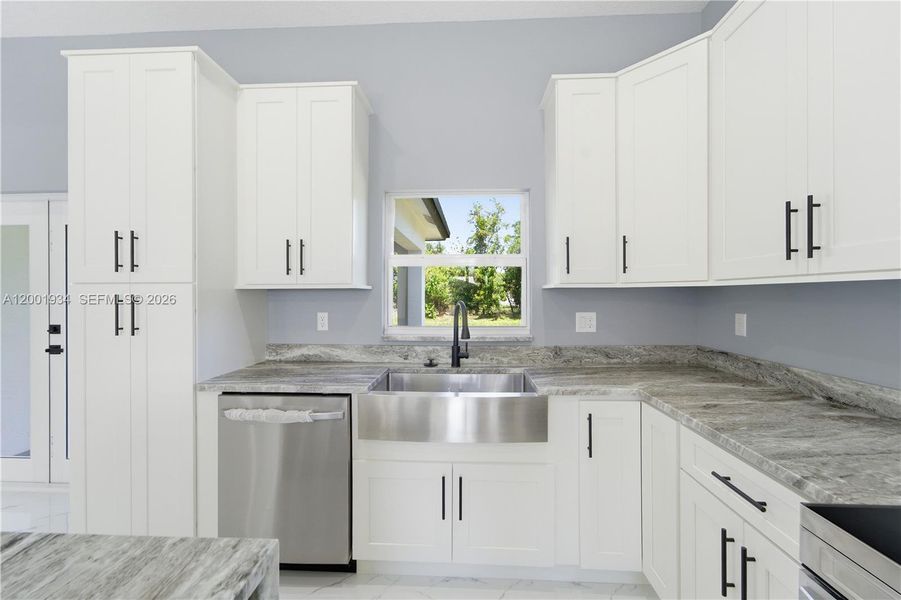 Furnished interior view inside a new home in , Port St. Lucie (Image 6).