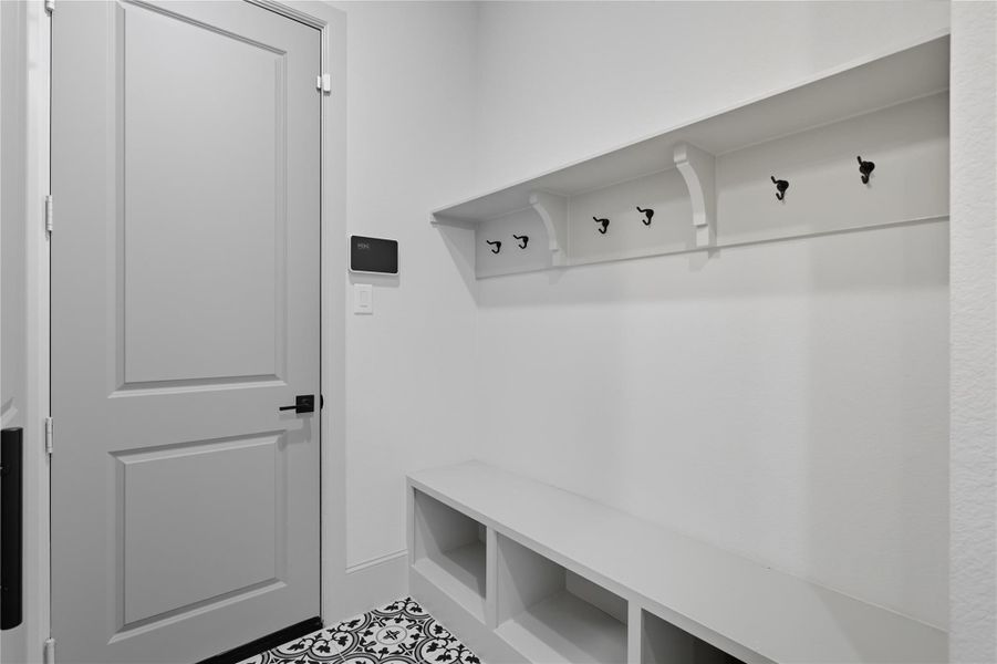 Mud room upon entering from garage. Mud room upon entering from garage.