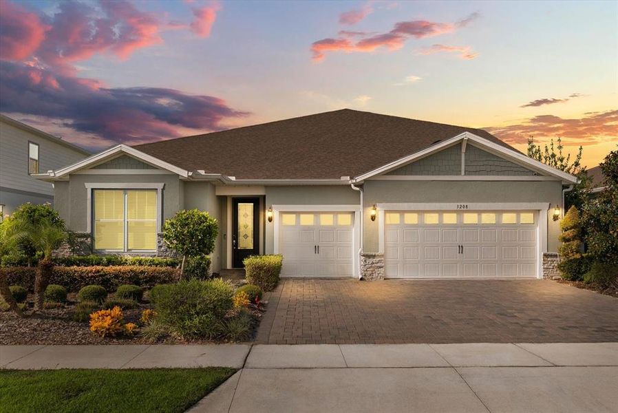 Front exterior of a new home in , Winter Garden, FL, highlighting curb appeal (Image 21).