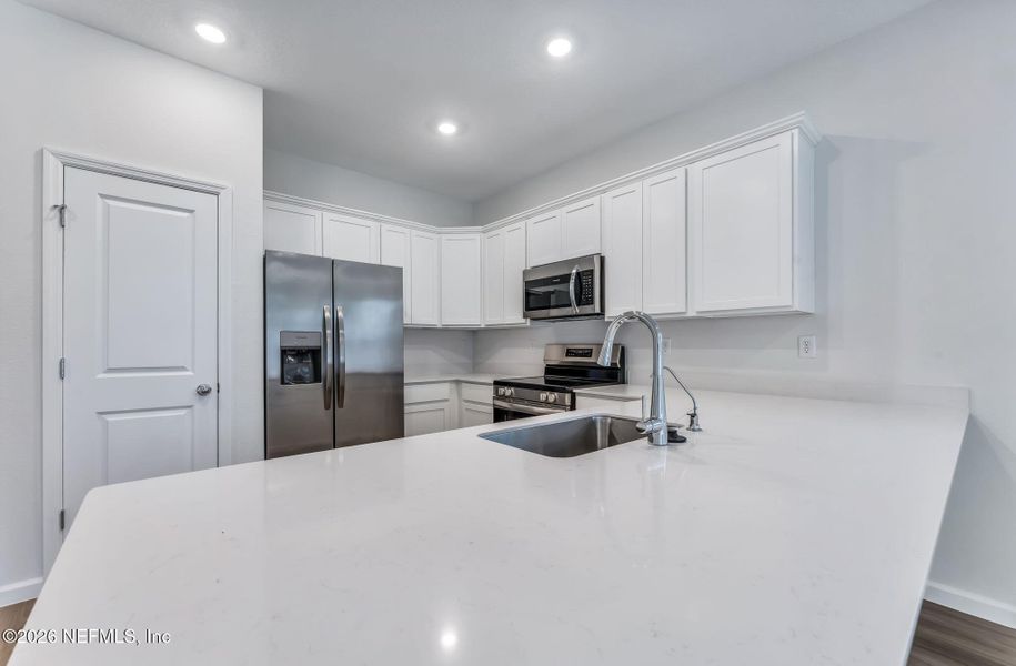Furnished interior view inside a new home in , Orange Park (Image 8).