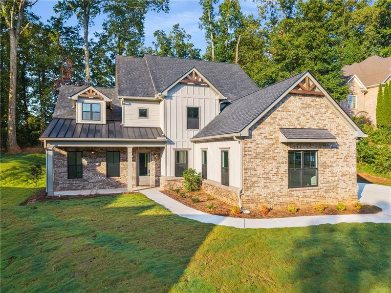 Front exterior of a new home in , Jefferson, GA, highlighting curb appeal (Image 25).