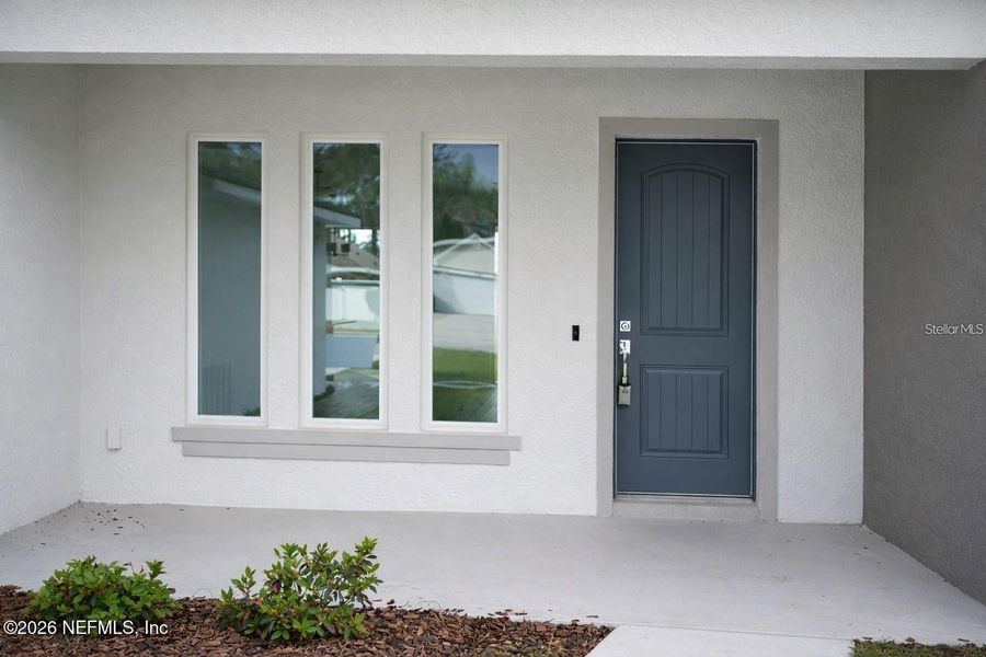 Exterior details and patio area of a home in , Palm Coast (Image 3). Exterior details and patio area of a home in , Palm Coast (Image 3).