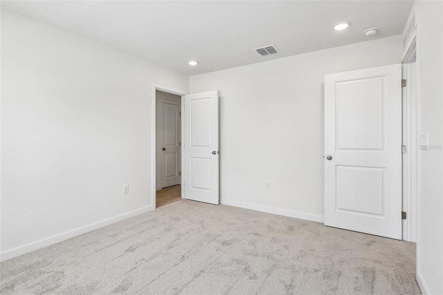 Spacious, unfurnished interior of a new home in Cyrene at Harmony, St. Cloud (Image 26). Spacious, unfurnished interior of a new home in Cyrene at Harmony, St. Cloud (Image 26).