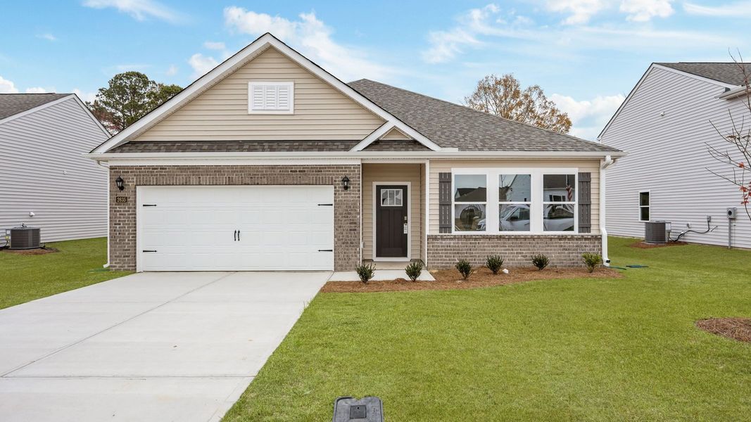Front exterior of a new home in Villa Grande, Winterville, NC, highlighting curb appeal (Image 1).