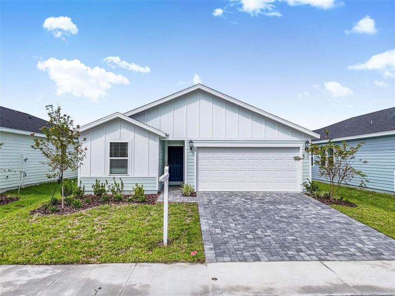 Front exterior of a new home in , Palm Coast, FL, highlighting curb appeal (Image 21). Front exterior of a new home in , Palm Coast, FL, highlighting curb appeal (Image 21).