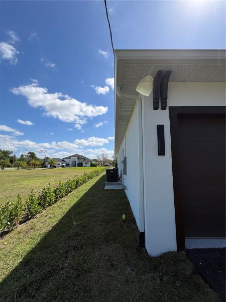 Exterior details and patio area of a home in , Naples (Image 24). Exterior details and patio area of a home in , Naples (Image 24).