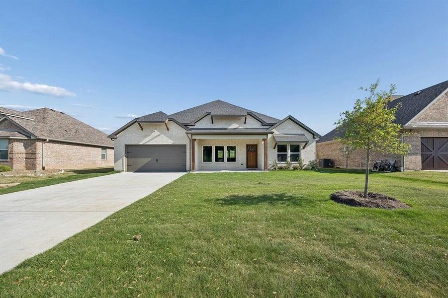 Front exterior of a new home in , Sherman, TX, highlighting curb appeal (Image 2). Front exterior of a new home in , Sherman, TX, highlighting curb appeal (Image 2).