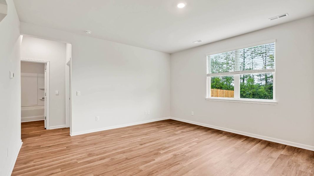 Spacious, unfurnished interior of a new home in Sidbury Station, Castle Hayne (Image 23).