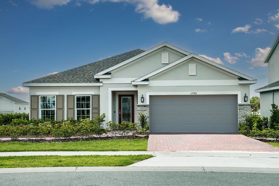 Representative exterior photo of a completed home built from the Selby Flex by Risewell Homes in Trinity Lakes, Groveland, FL (Image 1). Representative exterior photo of a completed home built from the Selby Flex by Risewell Homes in Trinity Lakes, Groveland, FL (Image 1).