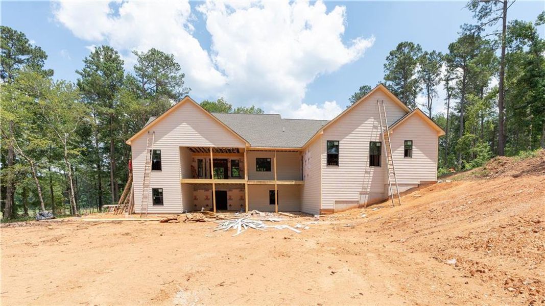 Front exterior of a new home in , Carrollton, GA, highlighting curb appeal (Image 20).